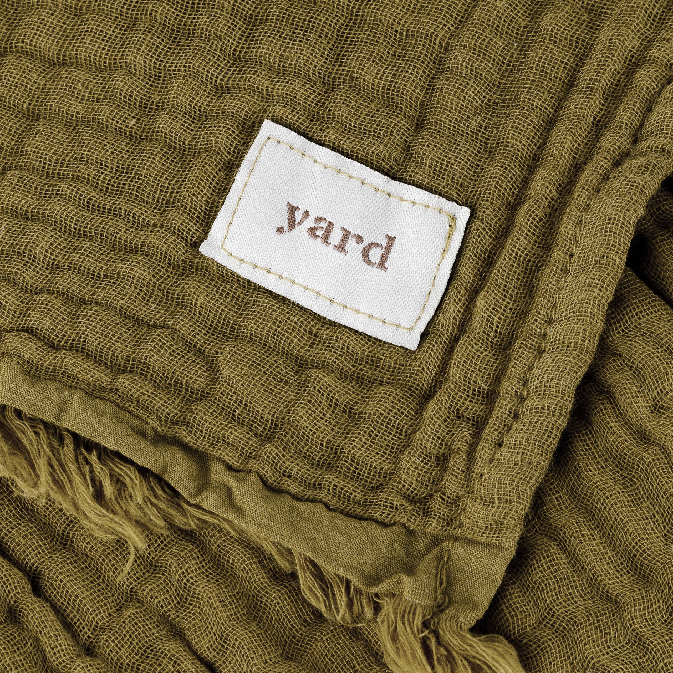 Lark muslin cotton throw in khaki