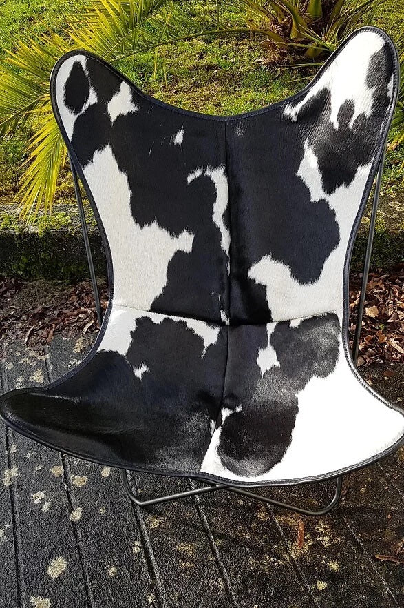 chaise airborne papillon AA, version peau vache noir et blanc
